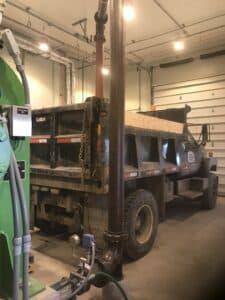 Schwing Bioset screw press truck loading process.